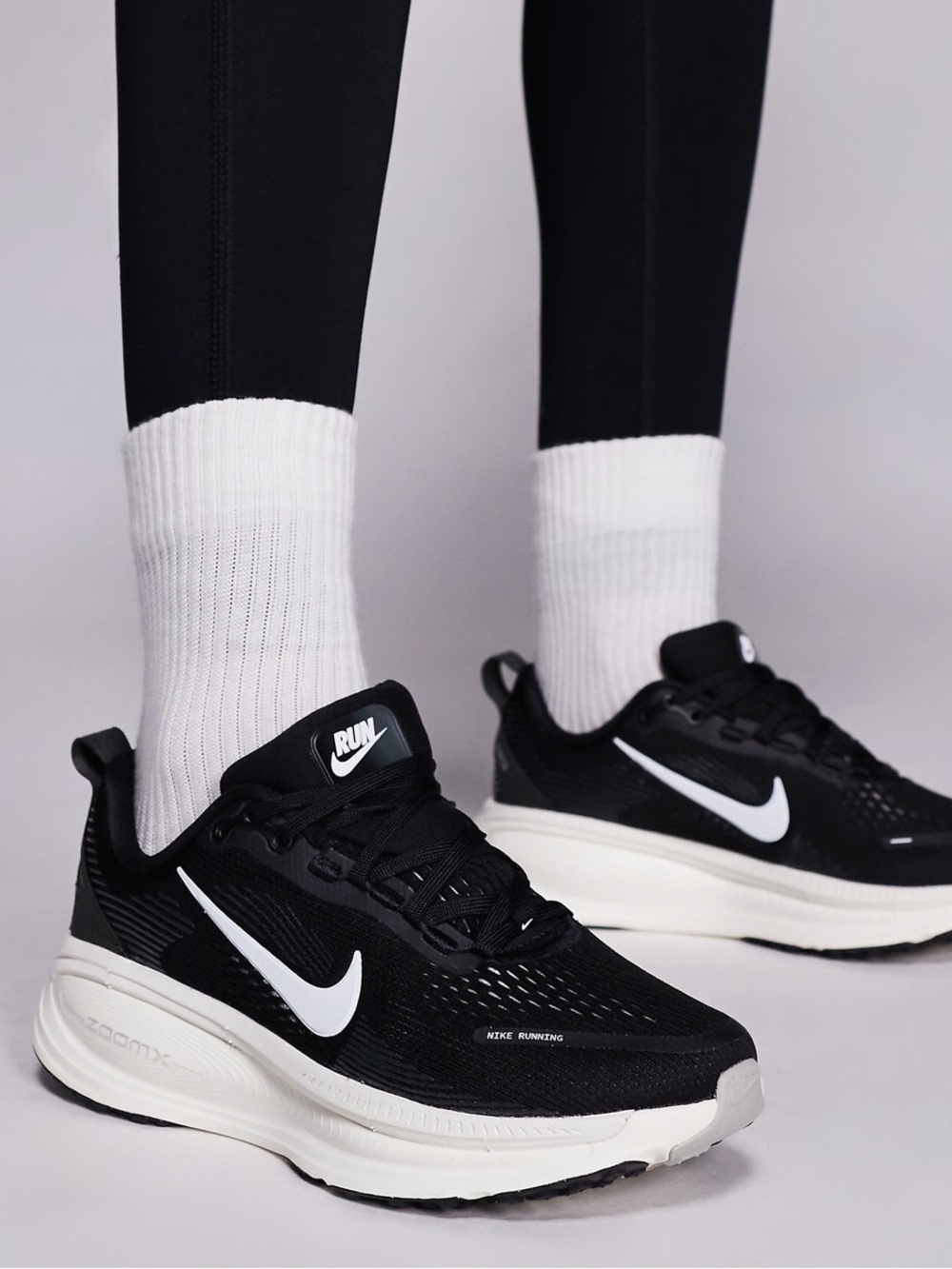 Nike Vomero 18 women 
Older Road Running Shoes black-white Sz 7Y gently used 8.5